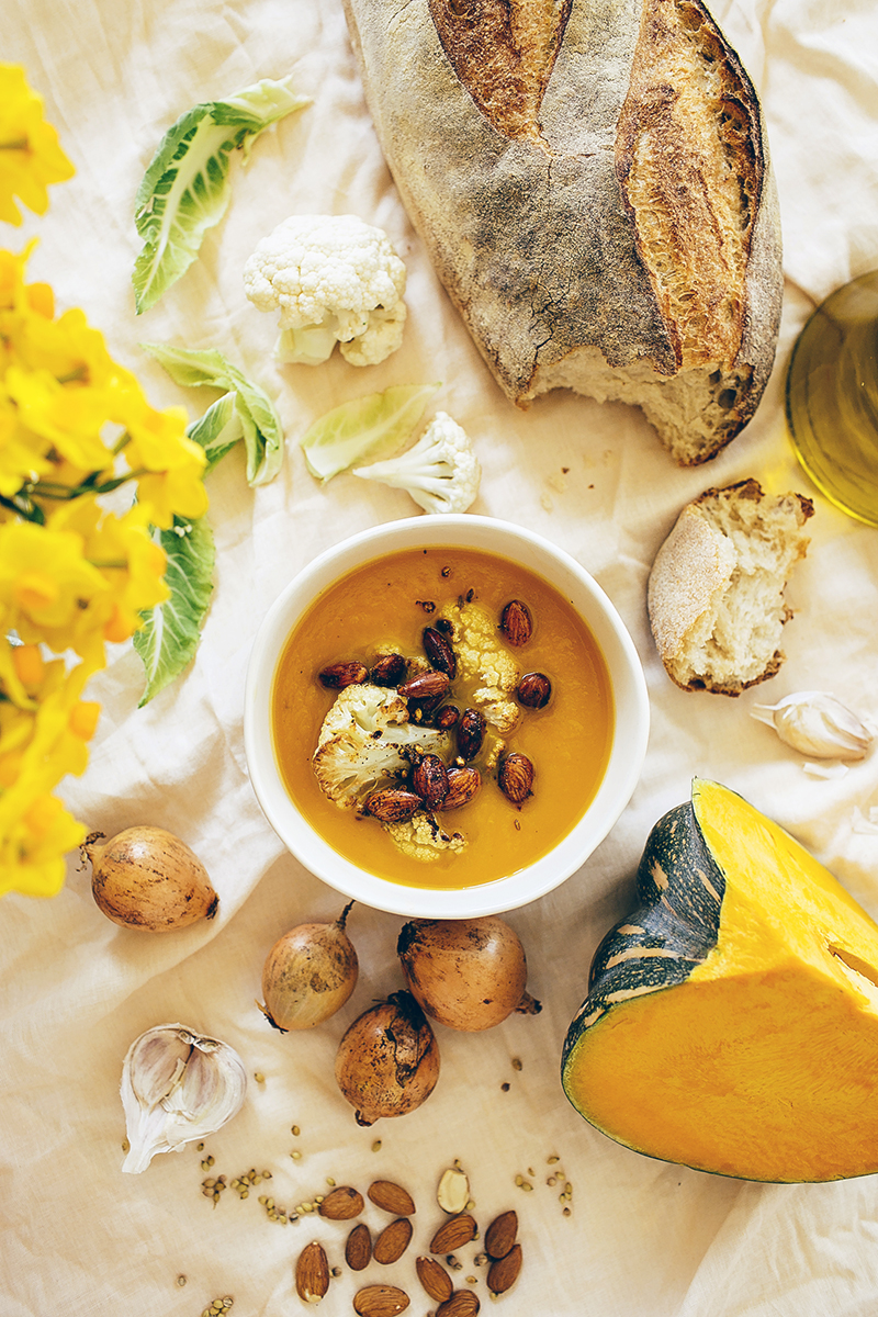 Pumpkin soup with roasted cauliflower and spiced almonds