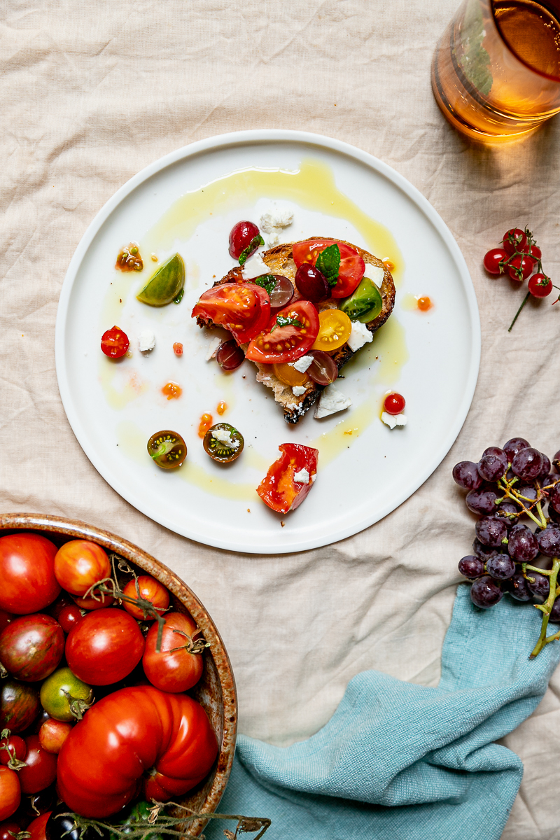 Tomato and Grape Bruschetta with mint and cheese